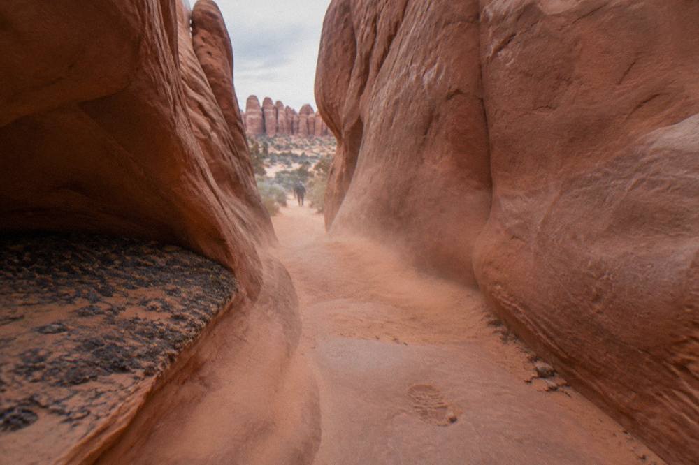 Tall parallel sandstone fins forming narrow corridors inside the Fiery Furnace